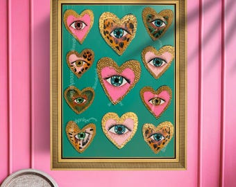 Puede incluir: Obra de arte enmarcada con diseños en forma de corazón con ojos. Los corazones presentan patrones rosas, dorados y de leopardo. Los ojos son azules, verdes y marrones. El fondo es turquesa y el marco es dorado.