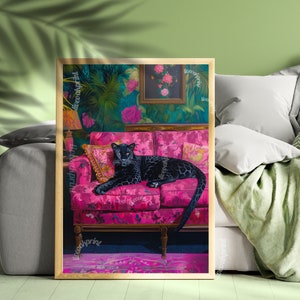 May include: A black panther lounges on a pink floral patterned sofa with gold accents. The sofa is in a room with a green and floral wallpaper.