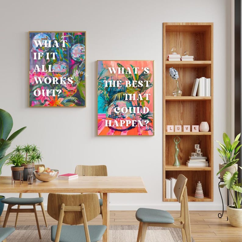 May include: Two colorful framed prints with motivational text. The first print has a pink, blue, and green background with the text "What if it all works out?" The second print has a pink, blue, and green background with the text "What's the best that could happen?"