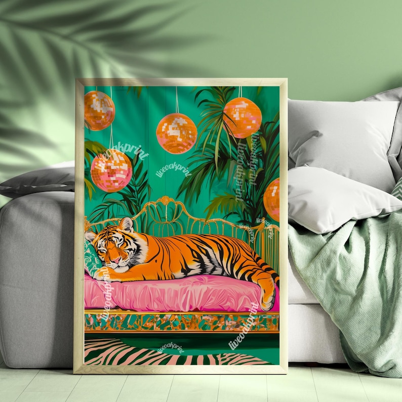 May include: A tiger lies on a pink chaise longue with a gold frame. The chaise longue is surrounded by lush green plants and disco balls. The background is a vibrant green.