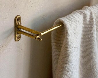 aged brass towel bar