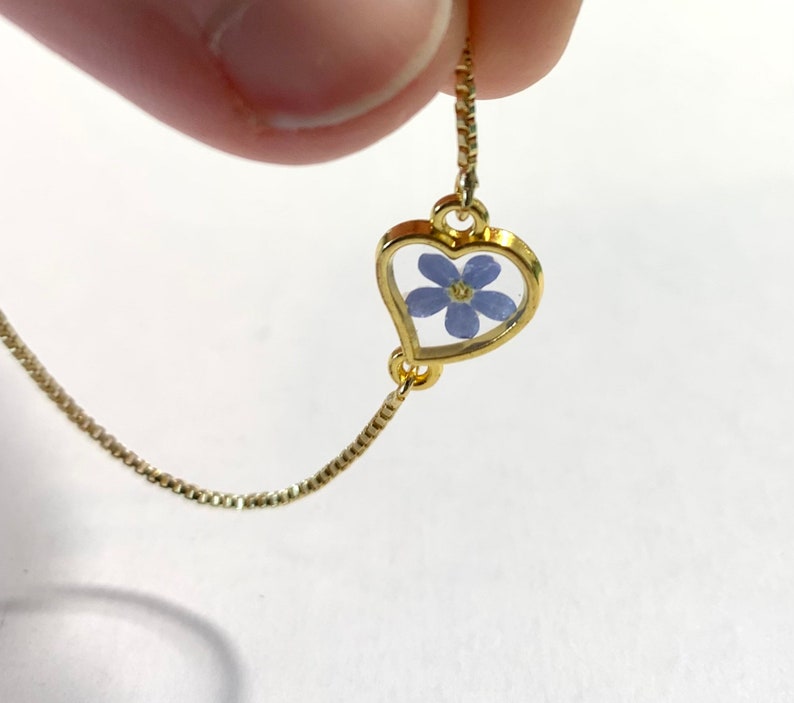 Adjustable bracelet real dried blue Forget me not flower in a heart, Myosotis, golden heart, 18K gold coated chain, resin, nature jewel image 4