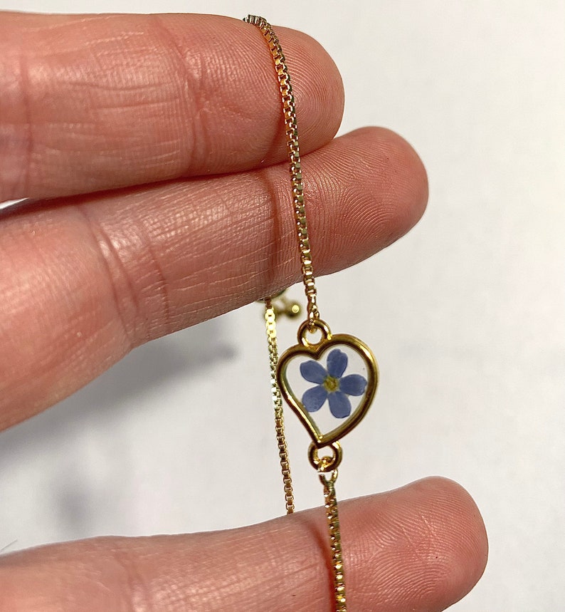 Adjustable bracelet real dried blue Forget me not flower in a heart, Myosotis, golden heart, 18K gold coated chain, resin, nature jewel image 2