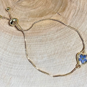 Adjustable bracelet real dried blue Forget me not flower in a heart, Myosotis, golden heart, 18K gold coated chain, resin, nature jewel image 1