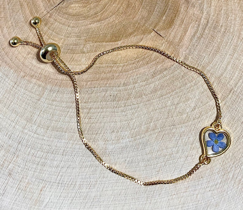 Adjustable bracelet real dried blue Forget me not flower in a heart, Myosotis, golden heart, 18K gold coated chain, resin, nature jewel image 1