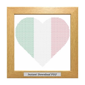 May include: A framed cross-stitch pattern of a heart shaped Italian flag in green, white, and red. The frame is light wood and the text "Instant Download PDF" is on a small plaque at the bottom.