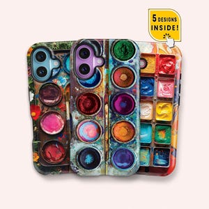 May include: Three phone cases with colorful designs resembling watercolor paint palettes. The cases feature various colors, including red, blue, green, and yellow. One case has a floral design. The text "5 DESIGNS INSIDE!" is displayed on a yellow tag.