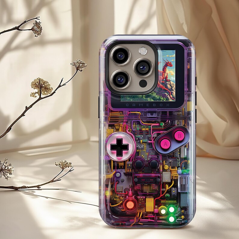 May include: Clear phone case with a retro video game design. The case features a colorful internal circuit board design, a screen displaying a dragon, and the word "GAMEBOX". Includes a directional pad and A/B buttons.