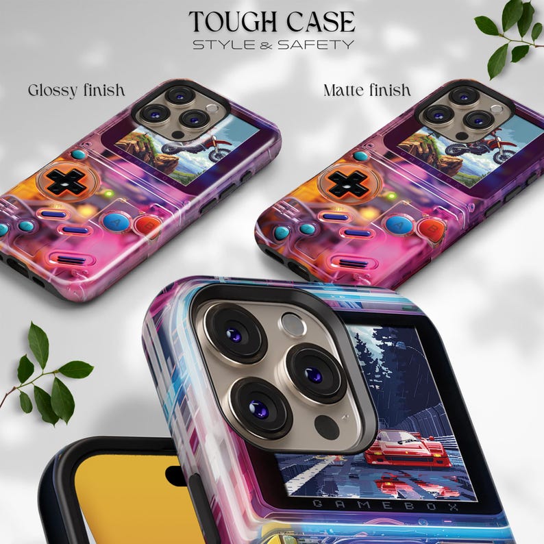 May include: Phone cases with a retro video game design. The cases feature a glossy and matte finish, with a colorful design of a game controller and a racing game scene. The text "TOUGH CASE STYLE & SAFETY" is visible.