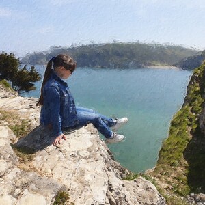 May include: A person wearing a blue denim jacket and jeans sits on a rocky cliff overlooking a calm, blue body of water. The scene is painted with an artistic, textured effect, suggesting a serene outdoor setting.