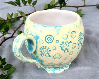 Round dance Kokopelli — ceramic tea or coffee cups