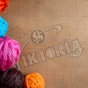 May include: A collection of colorful yarn balls in shades of orange, blue, pink, green, and white, arranged on a wooden surface. The image includes the text "Viktoria" in a stylized font.