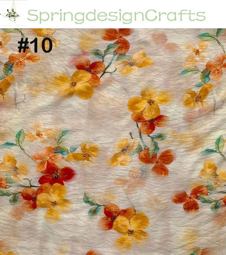 Peut inclure: Tissu floral avec un fond cr&egrave;me, orn&eacute; de fleurs orange et jaunes avec des feuilles vertes. Le tissu porte le texte "SpringdesignCrafts" et le num&eacute;ro "#10" en haut &agrave; gauche.