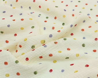 Katoenen gaasstof met kleurrijke stippen: gekreukte mousseline, materiaal babydoek, hobbystof naaien