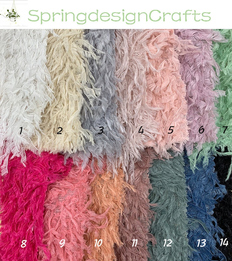May include: A collection of 14 different colors of feather trim fabric. The fabric is a soft, delicate material with a fringe edge. The colors include white, cream, gray, pink, lavender, green, blue, black, fuchsia, peach, brown, teal, denim, and black.