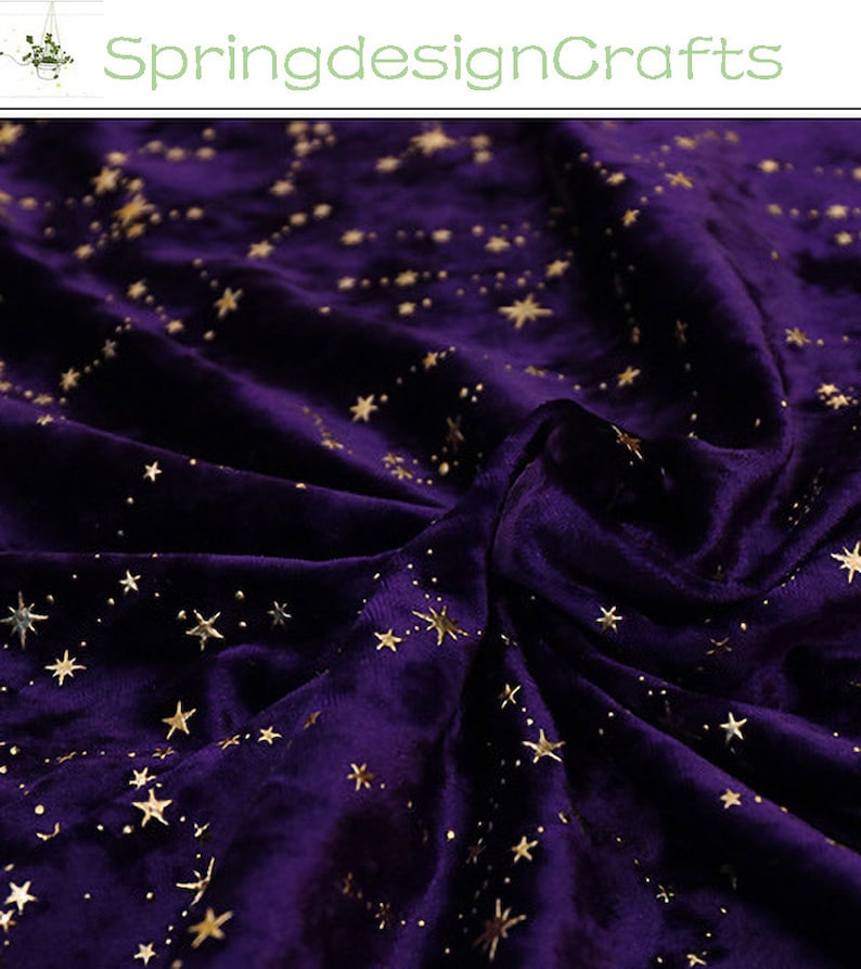 May include: Deep purple velvet fabric with a gold star pattern. The fabric is draped, creating shadows and highlights. The text "SpringdesignCrafts" is visible in the upper left corner.