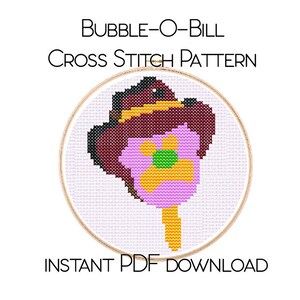 May include: Cross stitch pattern for a purple flower with a yellow center and a brown hat on top. The pattern is in a round wooden embroidery hoop. The text "BUBBLE-O-BILL CROSS STITCH PATTERN" is above the hoop and "INSTANT PDF DOWNLOAD" is below the hoop.