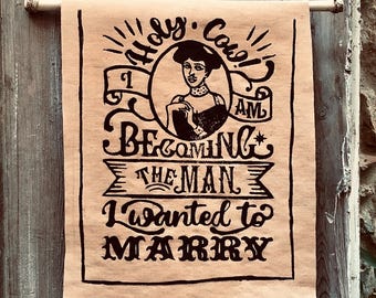 Holy Cow! I Am Becoming the Man I Wanted to Marry! White t-shirt black letters vintage typography graphic print feminist quote t-shirt