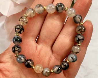 Pulsera rutilada de ágata y cuentas de oro