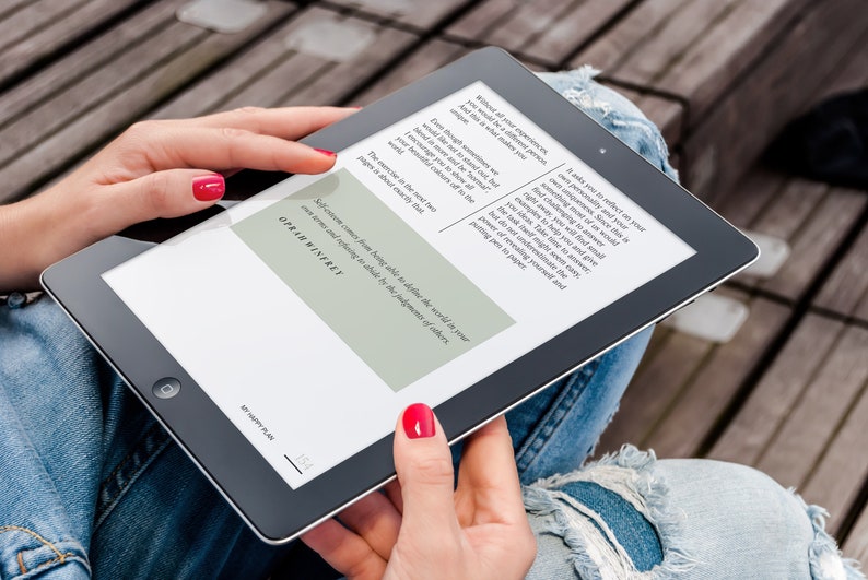 May include: A person is reading an e-book on a tablet. The text on the screen reads "Self-esteem comes from knowing who you are in the world, in your own skin and refusing to be defined by the judgments of others."  The author is Oprah Winfrey.