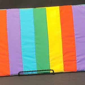 Wooden frame- mounted- quilt top- handcrafted- rainbow