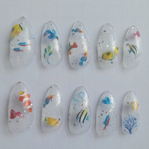 Fish fake nails in clear stiletto - medium length