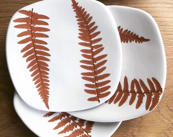 Handmade ceramic saucer with real leaf imprint