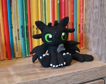 Black dragon with fish, toothless, made on order