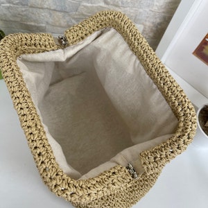 Inside the handmade straw bag has enough room for your keys, the phone also some makeup essentials.