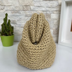 The Crochet Raffia bag is perfect for any occasion.