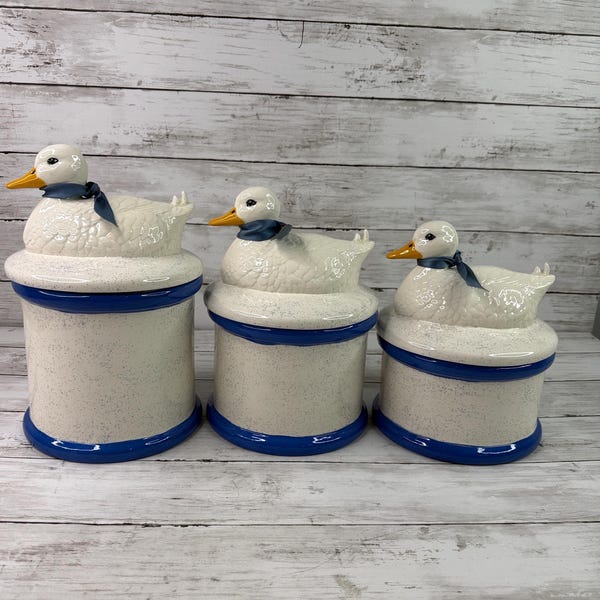 3 DUCK CANISTER SET  with blue ribbbons Grannycore 1980 decor Read description