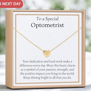 May include: A gold-colored heart pendant necklace on a white card with the text "To a Special Optometrist". The card is in a gold-colored box. The text on the card reads, "Your dedication and hard work make a difference every day."
