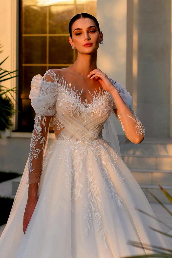 sheer shoulder wedding dress Casablanca Bridal 2547 Meline Wedding Dress Ballgown Sheer Corset Off The Shoulder Plunging Neckline Train Wedding Gown 2 / INS