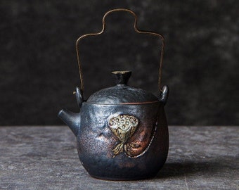 Embossed lotus Ceramic Teapot with Metal Handle