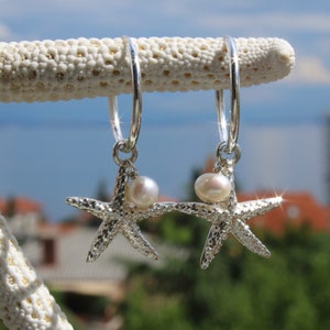 Starfish in love with freshwater pearl