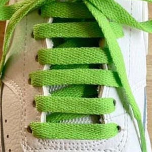 Colorful linden green flat shoelaces