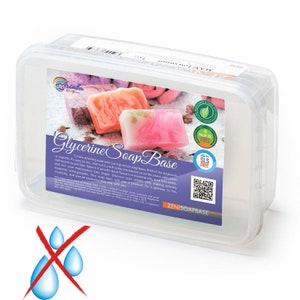 May include: A clear plastic container with a white label that reads "Glycerine Soap Base". The label also includes a QR code and the text "PALM OIL FREE" and "SLS FREE". The container is filled with a white soap base. The soap base is a clear, translucent material that is used to make soap.