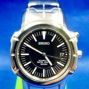 Vintage Seiko KINETIC SAPPHELX Crystal 5M42- 0G60 Men quartz watch.