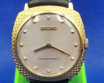 Vintage Seiko goudkleurige stijl Handopwindbaar horloge.