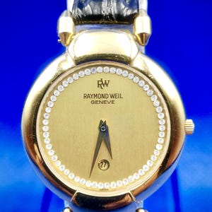 Vintage RAMOND WEIL Geneve Swiss 18 k Gold Electroplated women ‘s quartz watch. Plaque G 10 M.