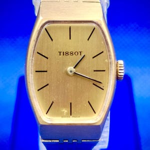 Vintage TISSOT Hand-Winding Lady watch. Gold Color Style. Plaque OR G 10 Microns.