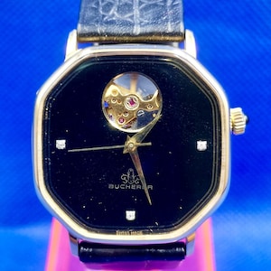 Vintage and Rare BUCHERER Hand-Winding Unisex watch. Goldplated G 10 Microns
