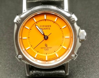 Vintage Citizen CQ 120 lady watch. Nice with Orange Face.