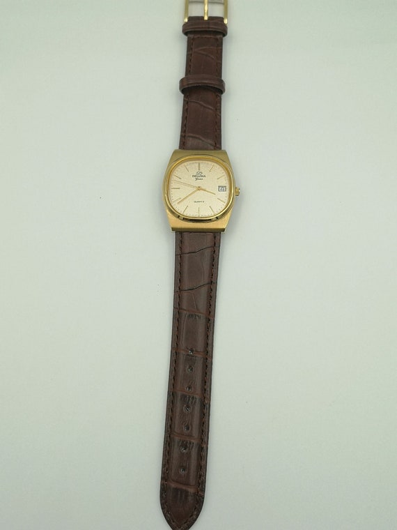 Vintage Delvina Geneve gold color watch. - Gem