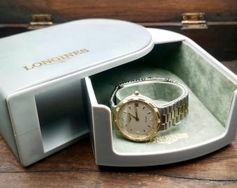 Vintage LONGINES Conquest Unisex quartz watch. Come with Box.