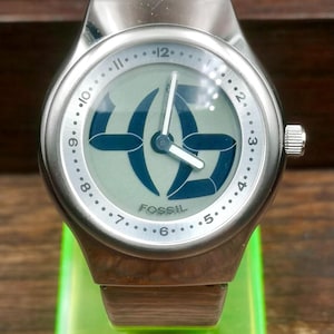 FOSSIL BIG TIC 腕時計 お花が咲く文字盤 FOSSIL - FOSSIL BIG TIC 腕時計 お花が咲く文字盤の通販 by Arouse 's