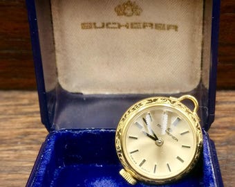 Reloj de pulsera BUCHERER vintage y raro para mujer, de cuerda manual. No incluye cadena. Se entrega con su caja original.