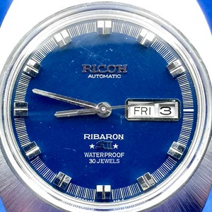 Vintage en zeldzaam RICOH RIBARON S II automatisch herenhorloge. Dag/datum. 30 juwelen.