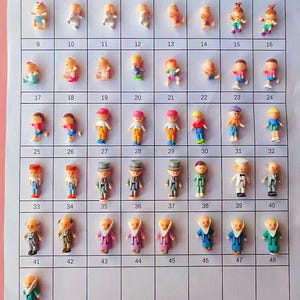 May include: A set of 48 miniature plastic figurines, representing a family, arranged in a grid pattern on a white background. The figurines are numbered 1 through 48.