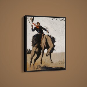 May include: Framed vintage print of a cowboy riding a bucking bronco. The cowboy is wearing a black shirt, red scarf, and hat, holding a rope. The horse is brown and tan. The text "Let 'er buck" is at the top.